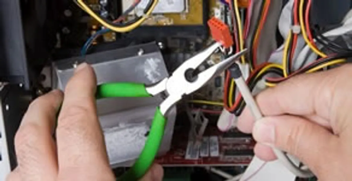 Licensed electrical contractor performing electrical repair with tools in Mountain View, CA